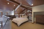 Loft Space over the Kitchen has a Queen Bed and Game Table